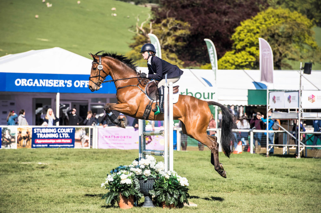 Tanya Horse jumping at show